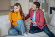 © DimaBerlin - Caring guy trying to explain justify to emotional girl. Offended wife ignoring husband making excuses. Spouses squabbling, arguing, fighting. Quarrel over distrust, jealousy, insecurity of woman.