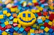 © grey - A smiley face emoji constructed from small colorful bricks.