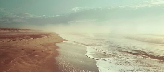 Poster - The beach and sea appear dreamy and nostalgic in the twilight or evening evoking a vintage and fantasy ambiance perfect for a copy space image