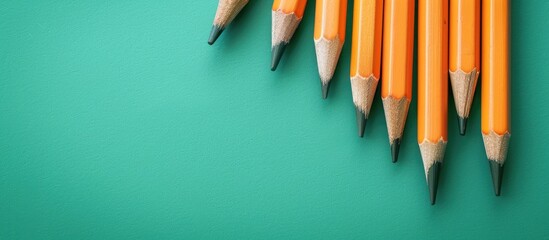 Aufkleber - Education theme with pencils on a green background creating a copy space image