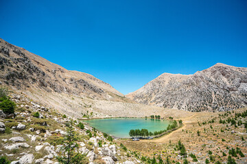 Poster - The scenic views of Green Lake, a crater lake, is on the Gömbe Plateau, famous for its unique geographical riches. It is on the slope of Akdağ, the second-highest peak of Antalya.