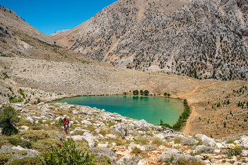 Wall Mural - The scenic views of Green Lake, a crater lake, is on the Gömbe Plateau, famous for its unique geographical riches. It is on the slope of Akdağ, the second-highest peak of Antalya.