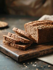 Wall Mural - Fresh loaf of bread sitting on a clean cutting board, ready for slicing and serving