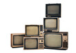© Pituk - Retro old televisions pile on floor in front with clipping path isolated on white background. Antique and vintage style, TVs blank screen display