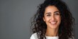 © Anastasiia - Radiant Middle Eastern woman with glowing skin and long curly dark hair smiling. Concept Portrait Photography, Middle Eastern Woman, Glowing Skin, Long Curly Hair, Smiling Pose