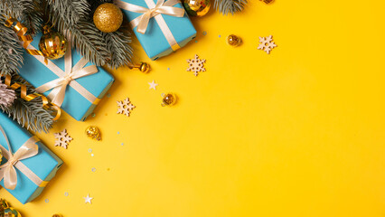 Wall Mural - Christmas bsnner background with New Year gifts and festive decorations top view. Copy space
