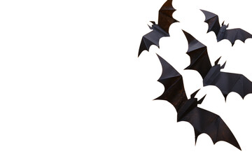 halloween and decoration concept - paper bats flying isolated on white or transparent background