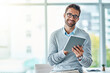 © SensSai/peopleimages.com - Portrait, glasses and man with tablet, office and smile for schedule in morning, online and accountant. Vision, bookkeeper and person in business for financial records of company, digital and happy