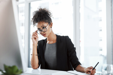 Poster - Glasses, smile and woman in office, computer and reading of research for story and journalist writing. Desk, online and inspiration for writer of news, brainstorming and professional for article