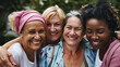 © Maestro - Diverse group of joyful women hugging and smiling, symbolizing friendship, unity, and happiness in an outdoor setting