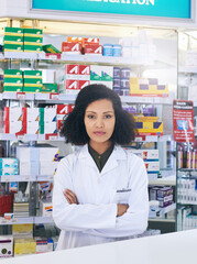 Poster - Pharmacy, pharmacist and portrait of woman with crossed arms for wellness, medicine and medical service. Healthcare, pharmaceutical and person in dispensary for medication, supplements and inventory