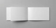 © Adisorn - Empty horizontal bi-fold A4-sized brochure template in white color, featuring a blank front and inside spread, perfect for graphic design and mockup purposes.