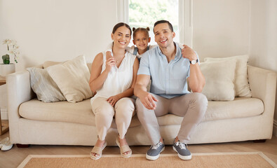 Sticker - Girl, parents and hug with portrait on couch, support and embrace for bonding family. Love, child and happiness for married people in home, living room and mother for together and care in lounge