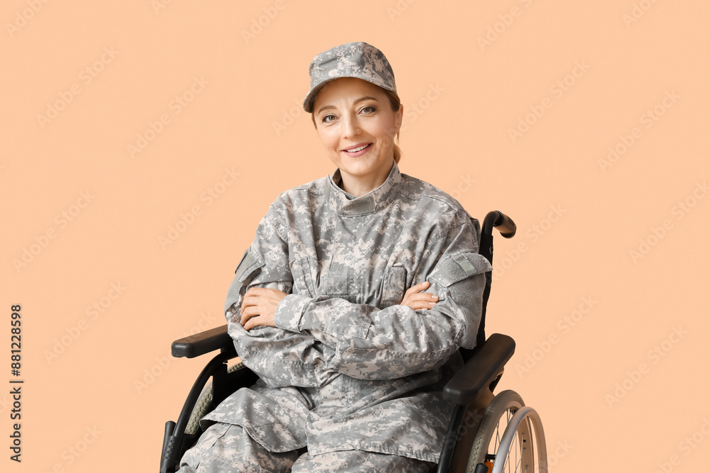 Female soldier in wheelchair on beige background