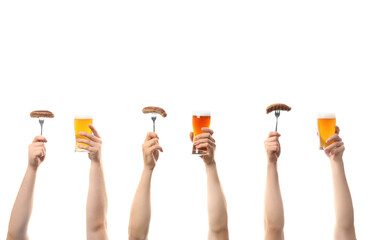 Hands with glasses of beer and sausages on white background