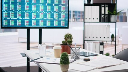 Poster - stock market diagrams with charts and stock figures on big screen in empty workplace. forex investme
