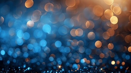 A blue and gold bokeh blur background with lights. 