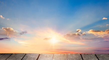 Wall Mural - wooden floor and sky sunset background