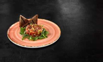 Sticker - Tuna Tartare with Avocado and Crispy Toasts on a Stylish Plate