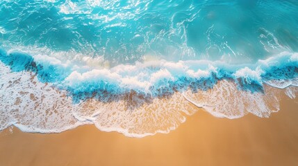 Wall Mural - Gentle ocean waves on sandy beach with sunlight Tropical beach with copy space overhead view