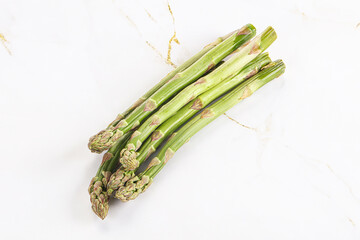 Wall Mural - Fresh green asparagus - vegan cuisine