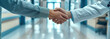 © Nathasa - Close up doctor hands shake with hospital background.