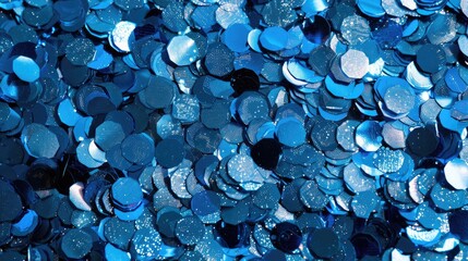 Blue shiny sequins covering the background extensively