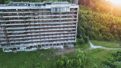 Forsaken hotel in lush forest