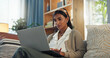 © peopleimages.com - Businesswoman, laptop and blog on couch for reading, email and digital report in home. Remote work, female journalist and internet for article, online and networking for feedback and research on sofa