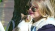 © okanakdeniz - Young Blond Woman with a Cat in Nature