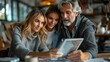 © Old Man Stocker - Family Using Tablet Together. An older man and two young women using a tablet together in a cozy, modern home environment.