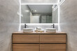 © Pavel - Modern bathroom with illuminated mirror and double vanity for a chic and contemporary look