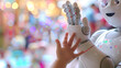 © bephoto - 子供とロボットのハイタッチ