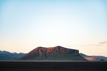 Wall Mural - Stunning view of a dramatic landscape during a breathtaking sunset.Icelandic nature offers an incredible variety of landscapes, from fjords, to mountains, to glaciers, to lava fields.