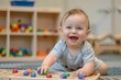 © Photock Agency - Happy Baby Playing with Colorful Toys