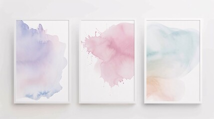 Poster - A trio of minimalistic abstract art posters with watercolor splash designs, aligned horizontally on a white wall. Each poster showcases fluid, organic splashes in soft pastel tones, blending art and