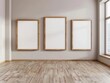 © Punn - 3 empty wooden frames mockup leaning against the wall