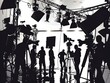 © YOGI C - Film Set Illustration with Cameramen and Lighting Equipment