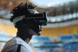 © Антон Сальников - Detailed photo of a person using VR technology in a public space with blurred stadium background