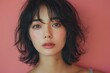 © Руслан Галиуллин - closeup portrait of Asian brunette woman on pink background, clean face
