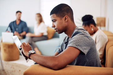 Poster - Tablet, research and man on sofa in office for coworking space with online trading app. Digital technology, freelance career and male person analyzing foreign exchange for stocks investment.