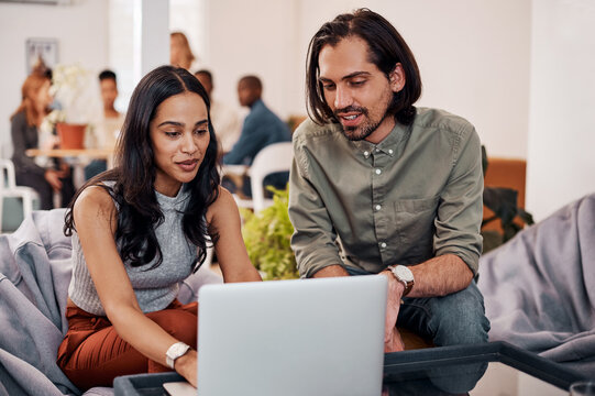 Laptop, colleague and office for collaboration, online and web designer for training with coworker. Computer, woman or man person for creative employee, digital and technology for website teamwork