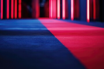 Poster - A vibrant red and blue carpet in a dimly lit room, perfect for capturing attention or creating ambiance