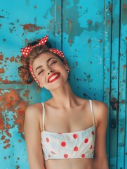 Woman with red polka dot headband smiling