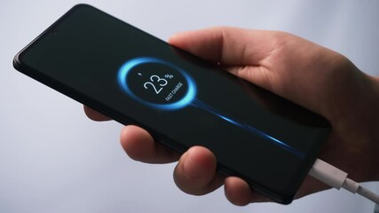 Charging phone really fast, using special turbo charge technology. Quick speed charging of a mobile phone. Fictional Interface.