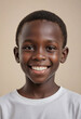 © jarntag - Portrait view of a regular happy smiling Senegal boy, ultra realistic, candid, social media, avatar image, plain solid background