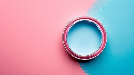 Poster -  A can of paint sits atop a multi-hued backdrop, featuring blue and pink tones; a pink speck adorns the can's center