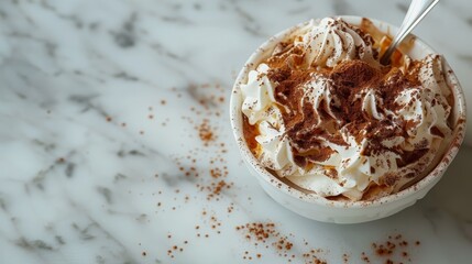 Canvas Print -  A marble table holds a mug of steaming hot chocolate, garnished with whipped cream and chocolate shavings A spoon rests beside it