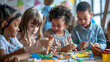 © domi002 - Children happily making a colorful flag together during a fun crafting session in the community.