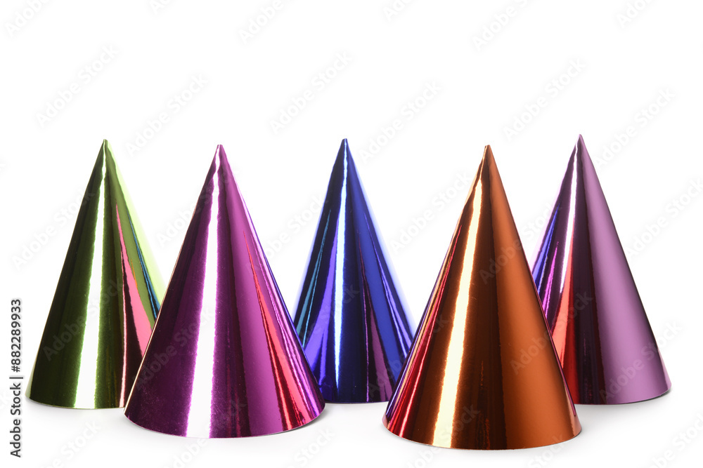 Colorful party hats on white background